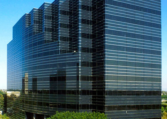 Exterior view of the 3 Hutton Centre Drive high-rise building